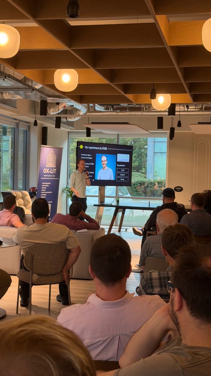 David Hewitt presenting his talk on FOSS and AI to attendees at DevTechTalks at Tripadvisor’s Oxford office.