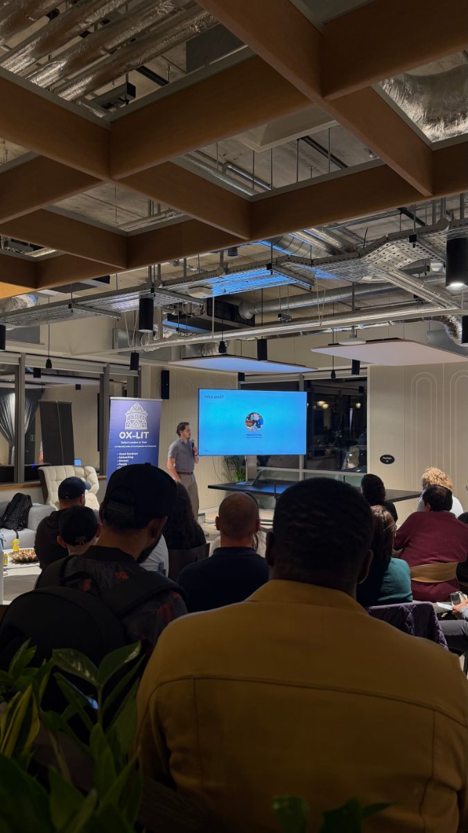 Edward Celella presenting a micro talk to attendees at DevTechTalks at Tripadvisor’s Oxford office.